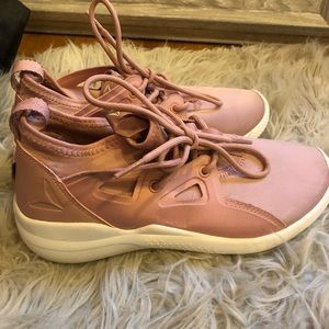 Pink reebok running shoes